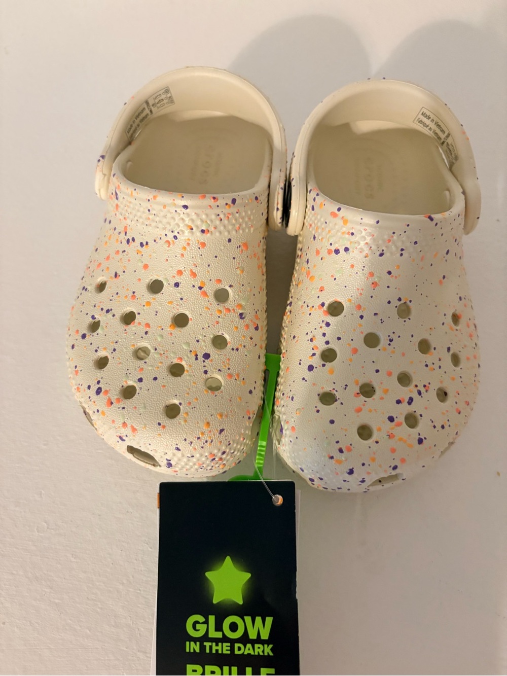 CROCS Kids Cream Glow-in-the-Dark Clogs with Orange & Purple Speckles